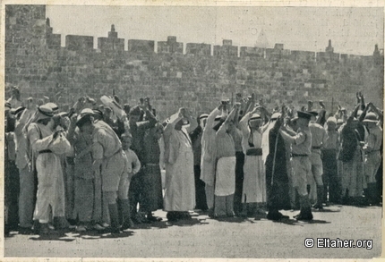 1936 - British soldiers searching Palestinians in front of Jerusalem walls